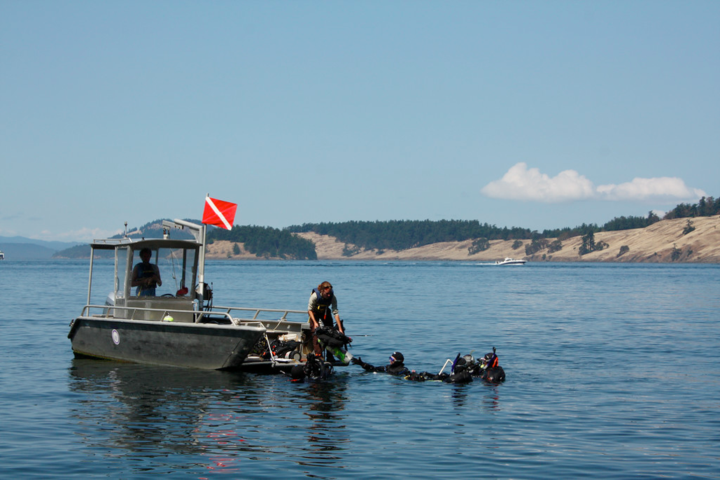 dive boat with SCUBA divers