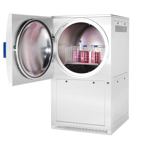 image of an autoclave with media bottles inside